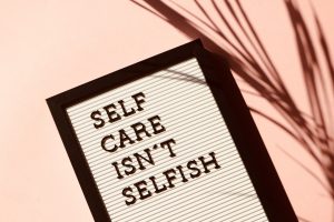 Sign saying 'self care isn't selfish'
