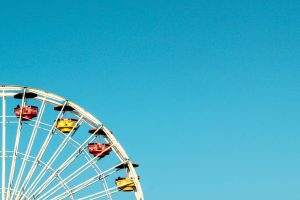 picture of half a ferris wheel turning in the sky - when you feel good and when you feel bad